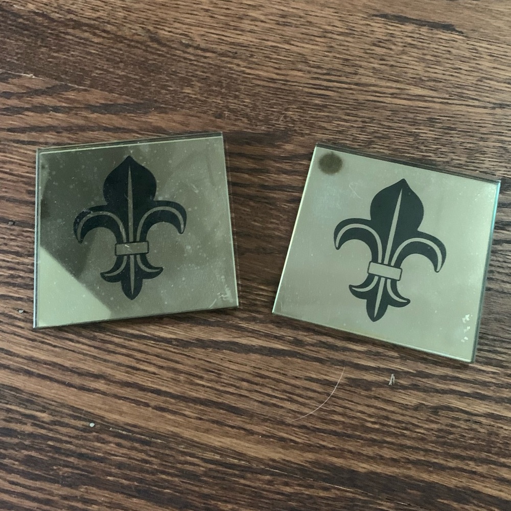 TWO MIRRORED COASTERS WITH FLEURS DE LIS